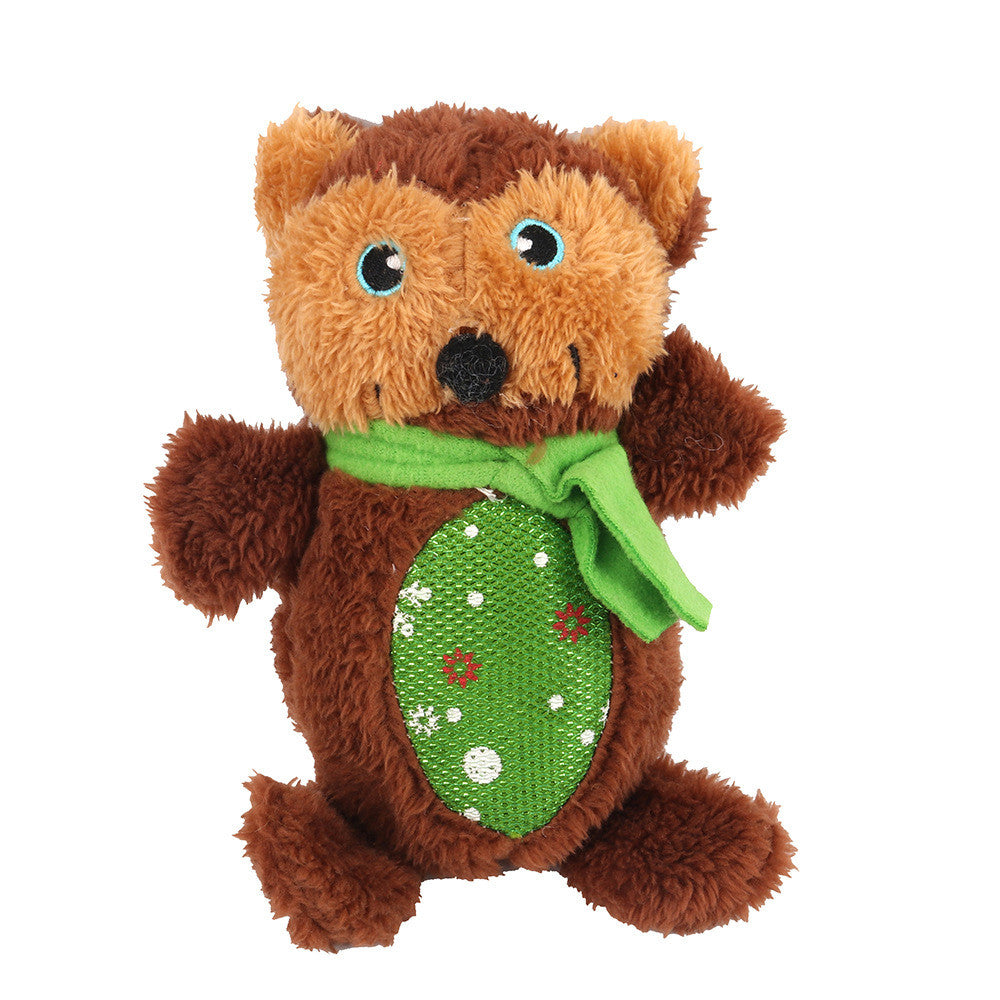Plush bear toy with a green scarf and heart-shaped tag on a white background