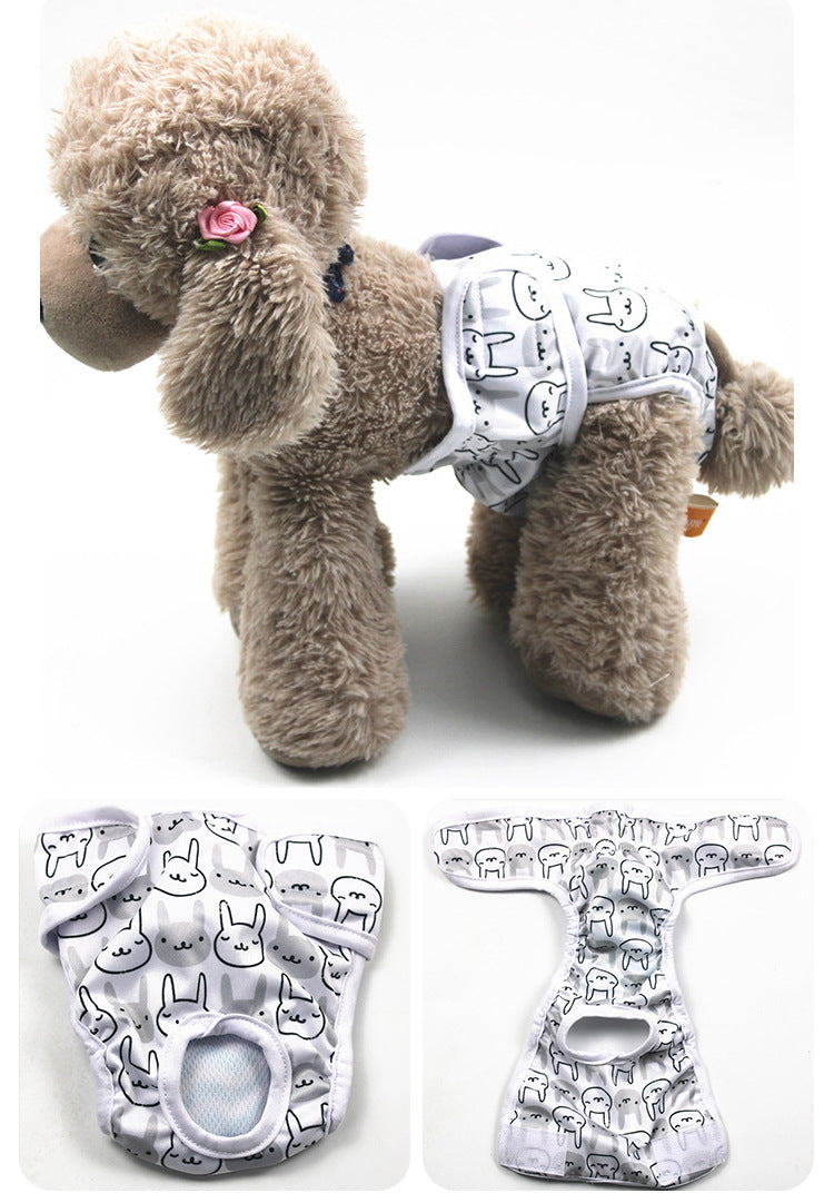 Small dog wearing a patterned diaper with two additional diapers displayed below on a white background.