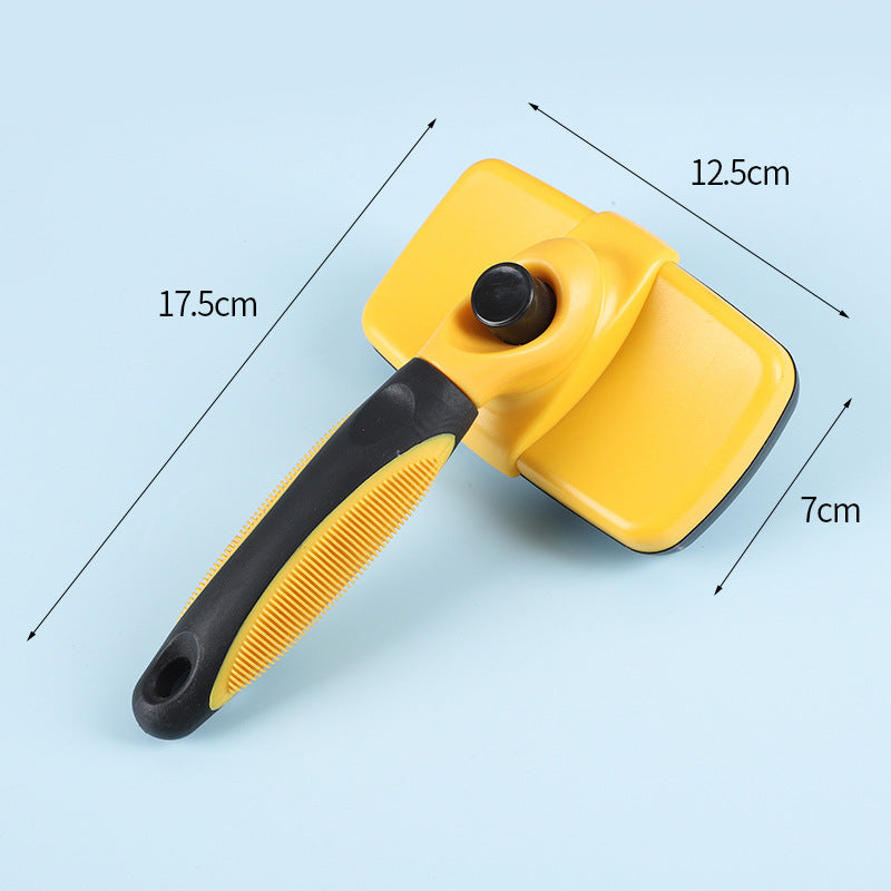 Yellow and black pet grooming brush with dimension labels showing 17.5cm length, 12.