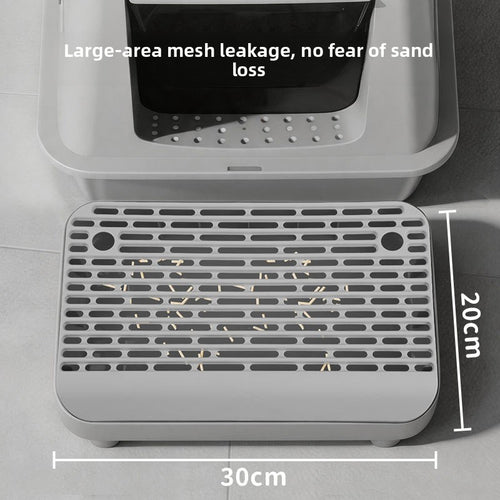 Gray plastic cat litter box bottom tray with measurement labels showing 30cm width and 20cm height, overlaid with text about large-area mesh leakage.