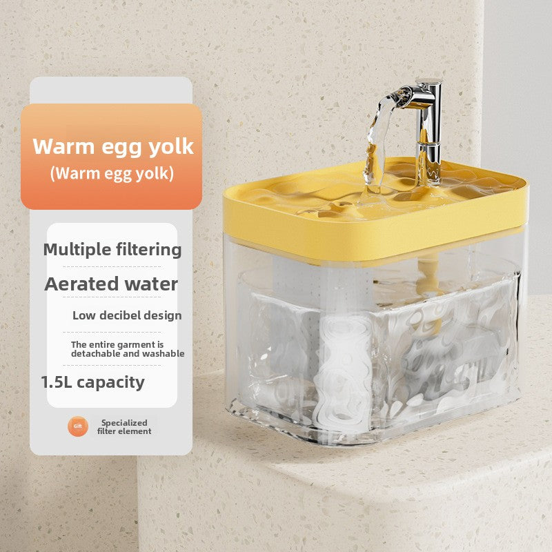 A countertop water filter pitcher with a yellow lid and clear body, shown with water flowing from a small faucet. Text on the left describes the warm egg yolk color, multiple filtering, aerated water, low decibel design, 1.