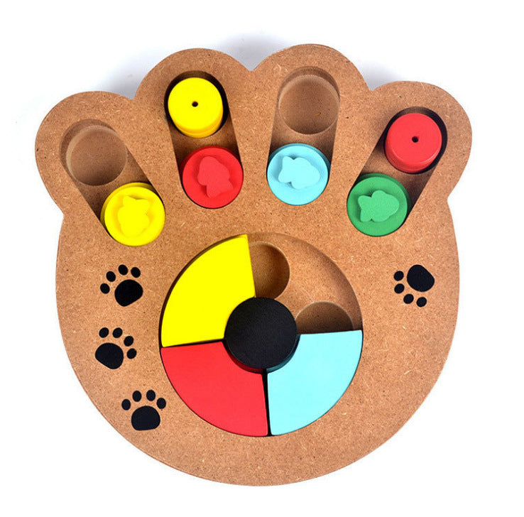 Colorful paw-shaped toy with various colored buttons and designs on a white background