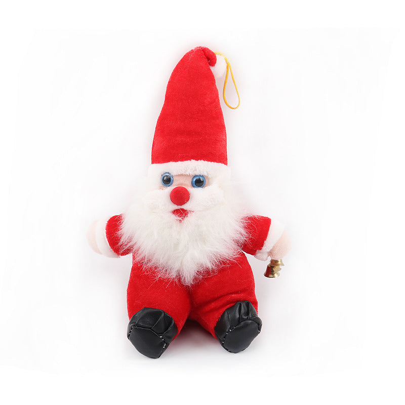Small plush toy resembling a Santa Claus figure on a white background