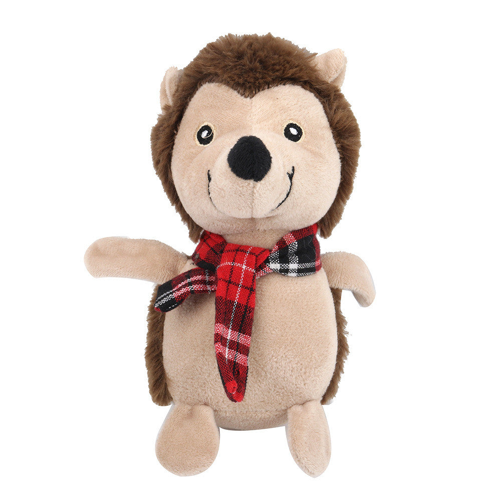 Plush hedgehog toy with a red plaid scarf on a white background