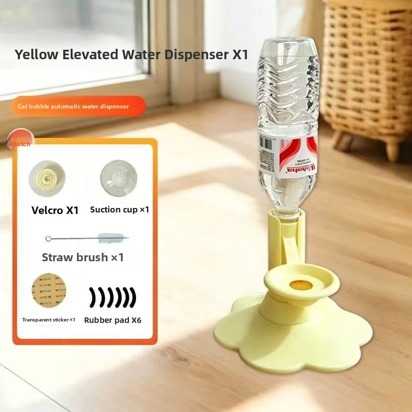 Yellow elevated cat water dispenser with a suction cup base, shown holding a clear plastic water bottle. The image includes a product inset showing included accessories (Velcro, suction cup, straw brush, transparent sticker, rubber pad) and text reading 'Yellow Elevated Water Dispenser X1' on a light wood floor in a room setting.
