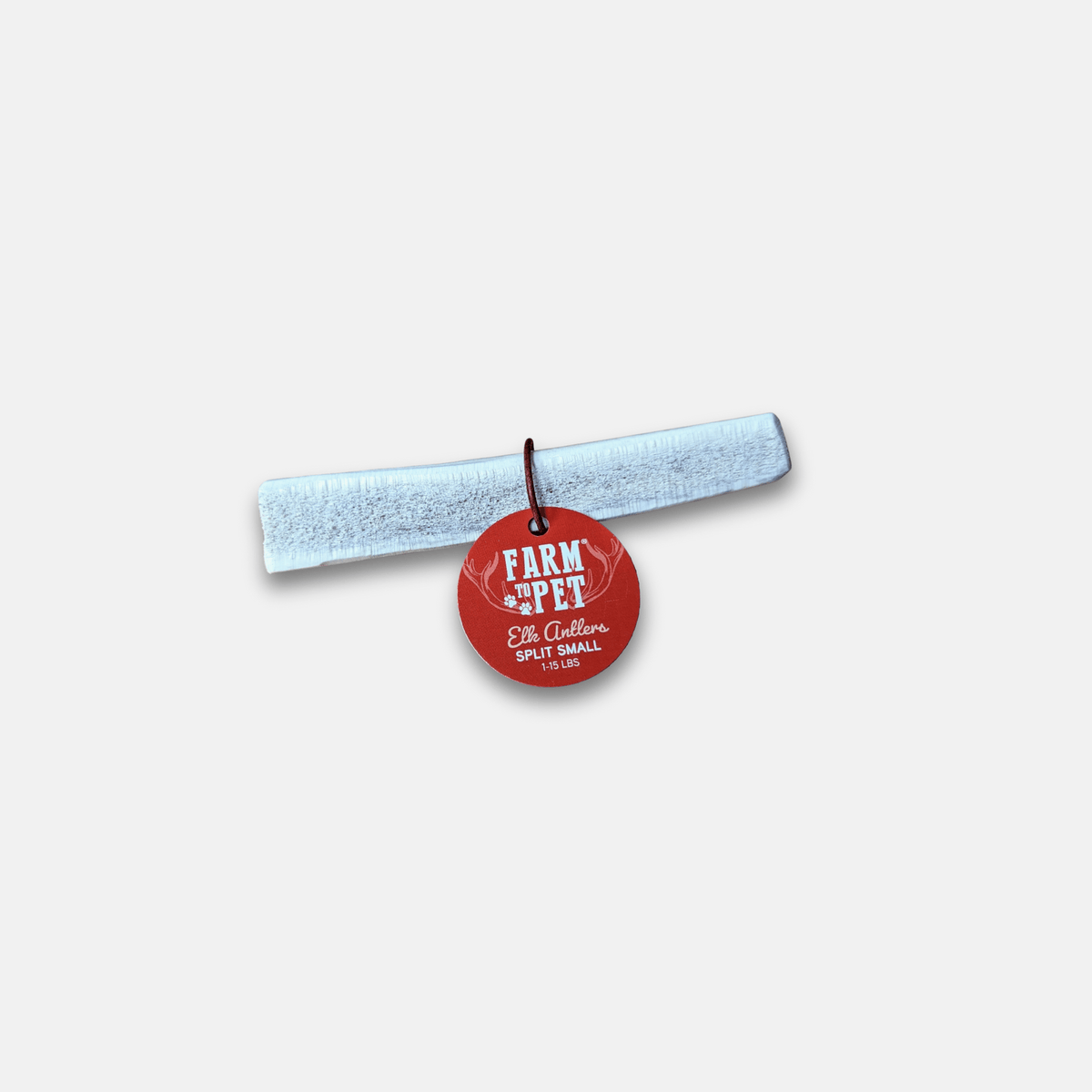 Red pet tag with 'Farm to Pet' text on a white background