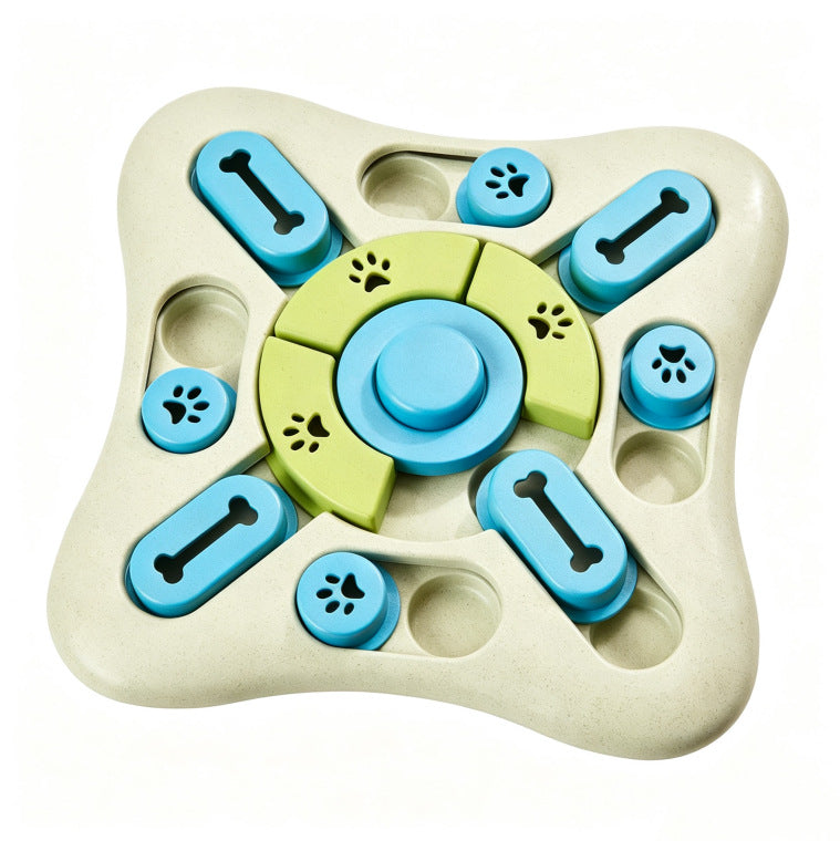A square-shaped dog puzzle toy with a cream-colored base, featuring blue sliding pieces with bone and paw print designs, and a light green circular center piece.