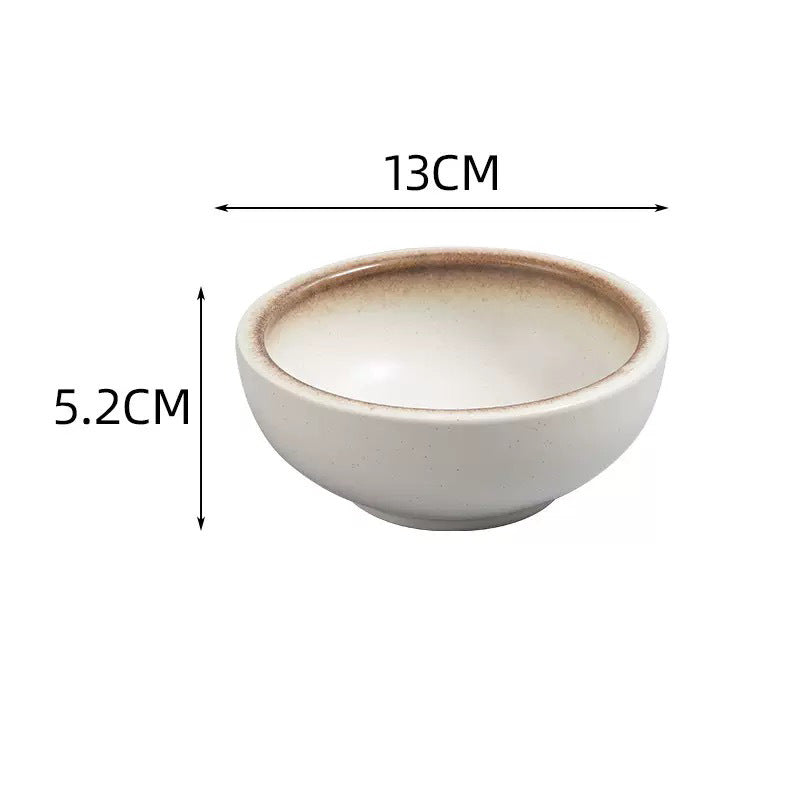 A small ceramic bowl shown on a white background with dimension lines and text indicating a width of 13CM, a height of 5.2CM, and a shallow depth of about 2.